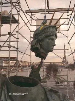 Liberty is dismantled in Paris in 1998.