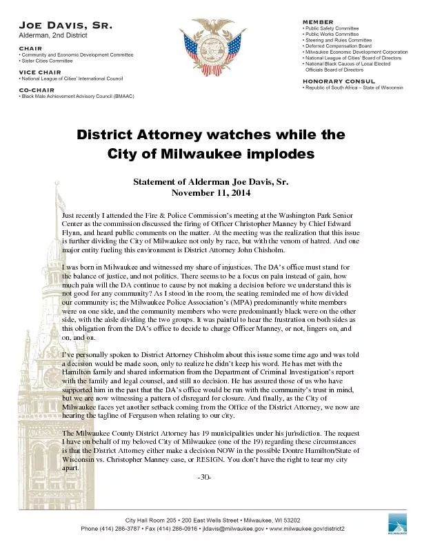 District Attorney watches while the