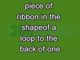 4.    Stick a piece of ribbon in the shapeof a loop to the back of one