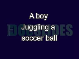 A boy Juggling a soccer ball