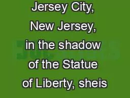 Jersey City, New Jersey, in the shadow of the Statue of Liberty, sheis